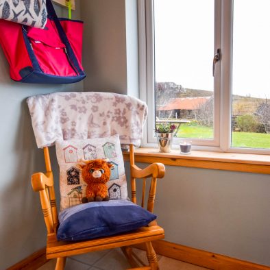 Relax in the rocking chair in our sun porch at Gables Cottage, Wester Ross