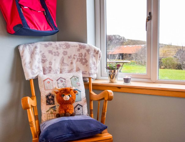 Relax in the rocking chair in our sun porch at Gables Cottage, Wester Ross