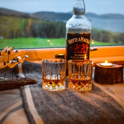 Enjoy a dram overlooking the Summer Isles when you stay at Gables Cottage